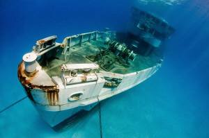 The newly-sunk wreck of the ex-USS Kittiwake.  Natural li... by Paul Colley 